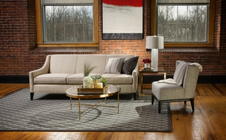 area rug in brick walled room
